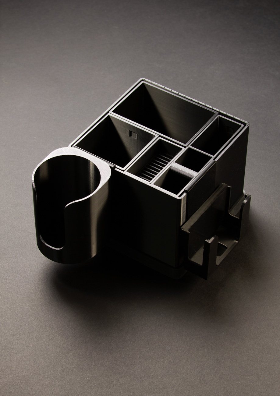 An assembled Ordo Box with a cup holder and side module